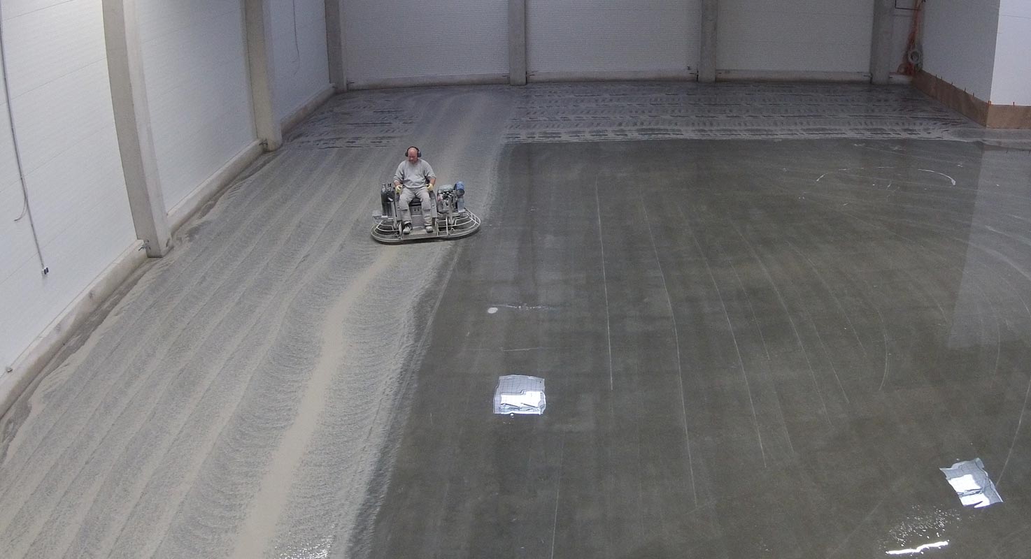 The 3-step grinding process removes the top layer of the concrete from industrial warehouse floor
