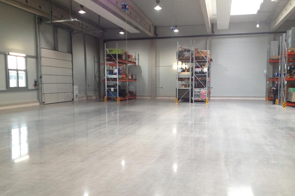Semi-gloss finish applied to industrial warehouse concrete floor